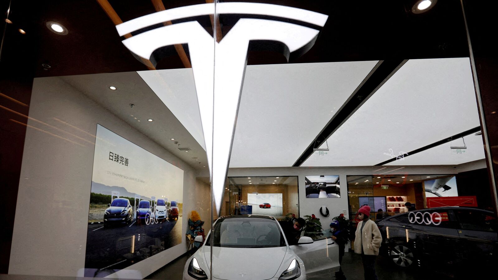 Tesla share price jumps 10% as Musk's pledge to build affordable cars allays growth concerns